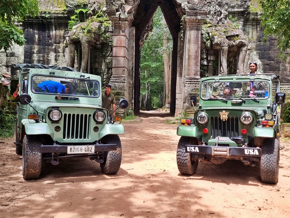 2 Mitsubishi jeeps in Cambodia