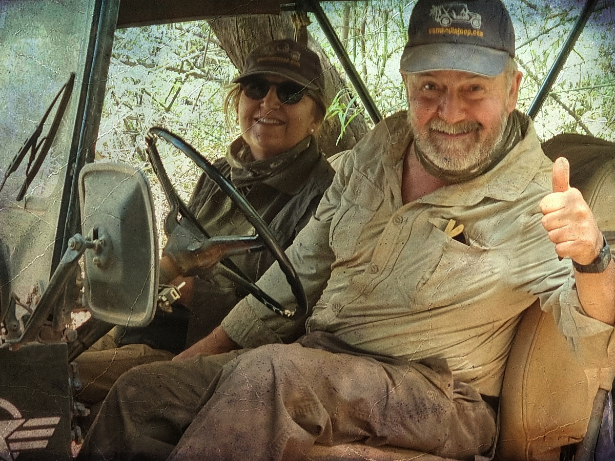 Guests driving jeep in Cambodia